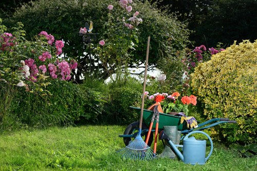Gardener reviewing complaint notes in a garden